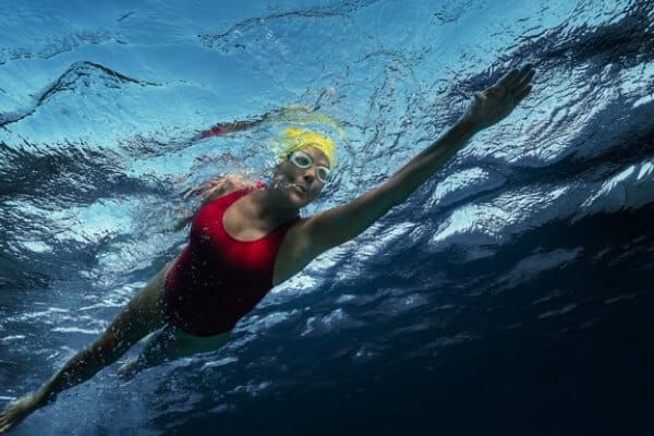 photo of Annette Bening as Diana Nyad swimming in a pool